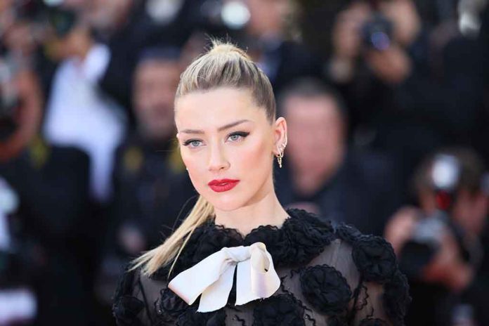 Amber Heard Fires Entire Team After Weeks of Nasty Headlines