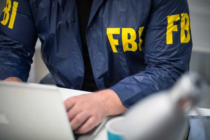Cropped,Photo,Of,Fbi,Agent,Using,Laptop,In,Office