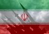 Iranian flag overlaid with image of military missiles.