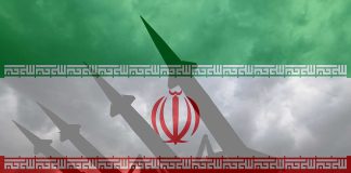 Iranian flag overlaid with image of military missiles.