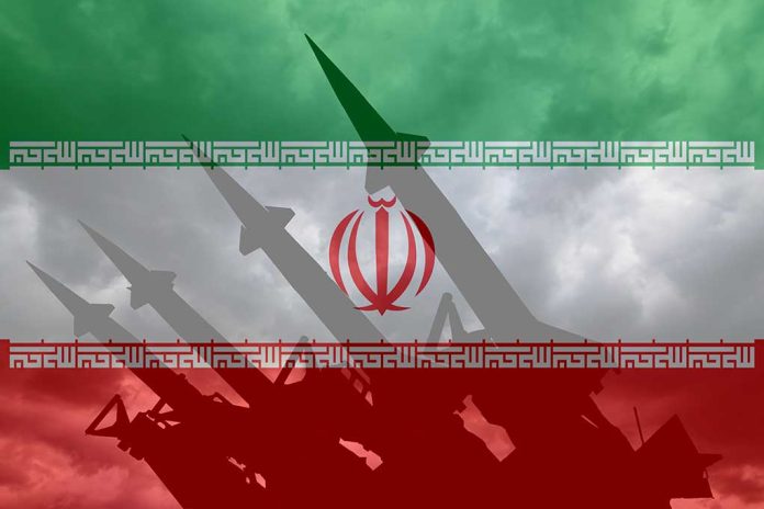 Iranian flag overlaid with image of military missiles.