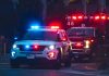 Police car and ambulance with flashing lights.