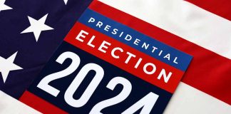 "Presidential Election 2024 sign on American flag background."