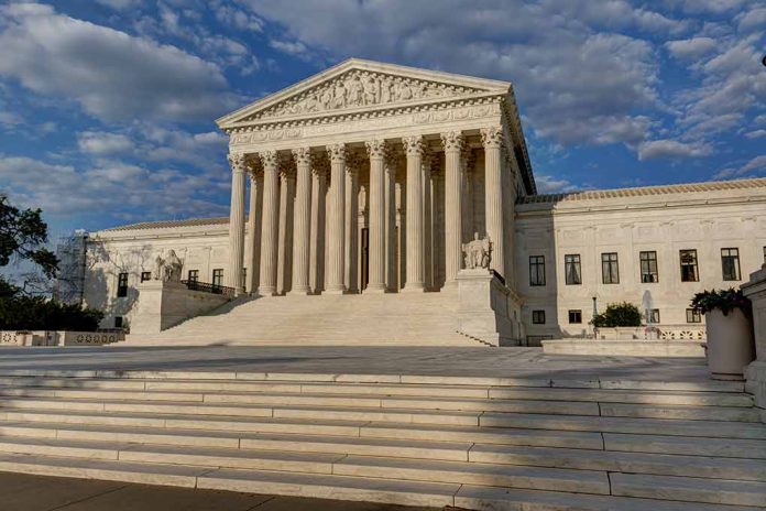 Supreme Court building with steps and columns.