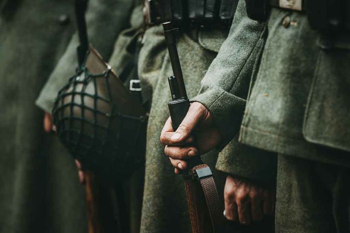 Soldiers in uniform holding rifles and grenades.