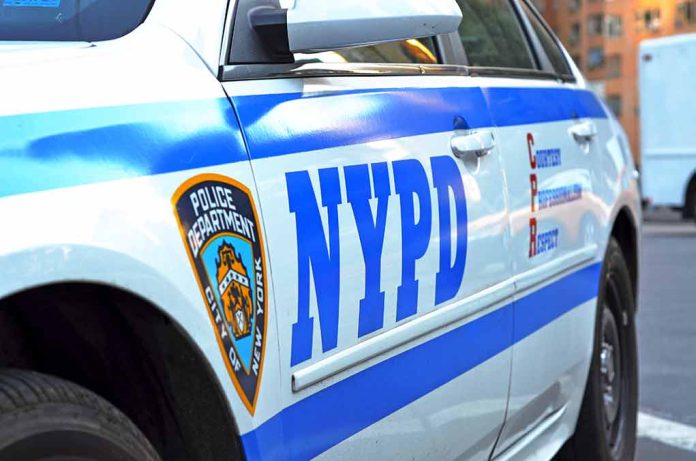 NYPD police car with logo and text.