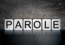 Blocks spelling "PAROLE" on grungy background.