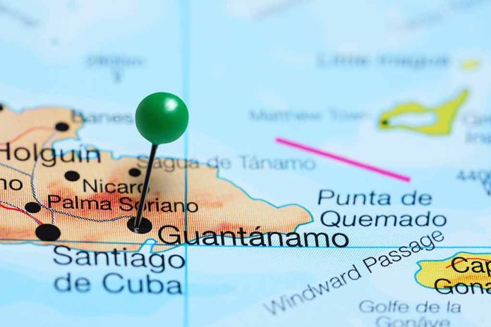 U.S. Flies "High-Threat" Migrants, Including Tren de Aragua Suspects, To Guantanamo Bay Facility