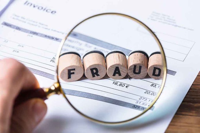 1042804675 featured image Magnifying glass showing FRAUD on an invoice