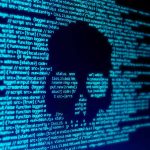 Blue code text with skull shape in center