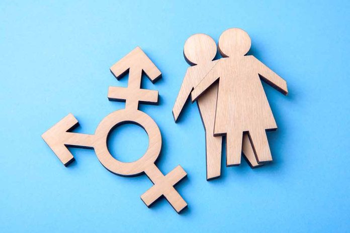 1145016626 featured image Wooden gender symbols on blue background