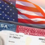 Closeup of US visa and flag image