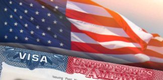 Closeup of US visa and flag image
