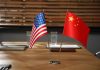 American and Chinese flags on a conference table