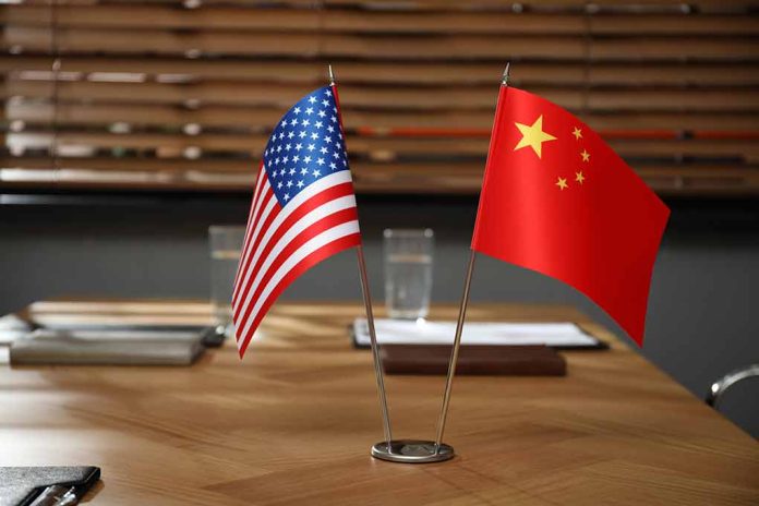 2183327065 featured image American and Chinese flags on a conference table