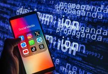 Smartphone showing social media apps with text background