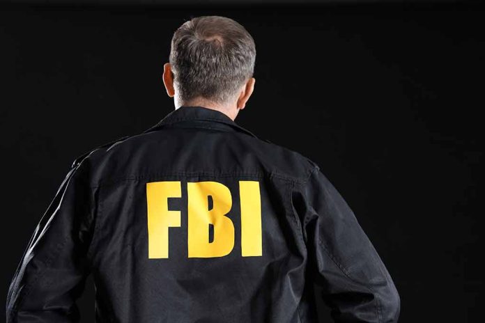 2473870221 featured image Person wearing jacket with FBI printed on back
