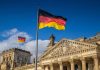 German flags at the Reichstag building in Berlin
