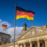 German flags at the Reichstag building in Berlin