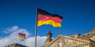 German flags at the Reichstag building in Berlin