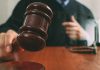 Judge with gavel making a decision in court