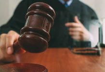 Judge with gavel making a decision in court