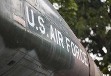 US Air Force plane with trees in background