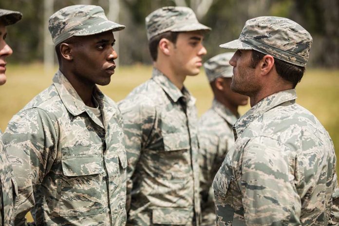 630916748 featured image Military personnel standing in line outside during inspection