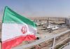 Iranian flag near an industry