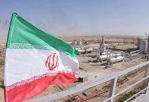 Iranian flag near an industry