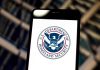 US Department of Homeland Security logo on smartphone