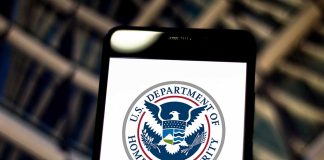 US Department of Homeland Security logo on smartphone