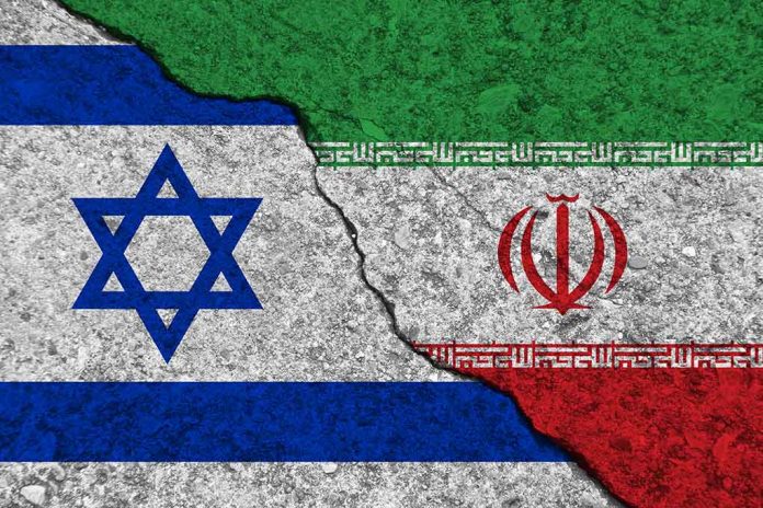 1607854726 featured image Israeli and Iranian flags divided by a cracked line