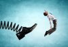 Man gets kicked by oversized shoe on spring
