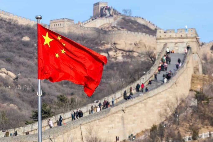 1145455832 Chinese flag by the Great Wall of China