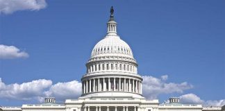 U.S. Capitol building against blue sky