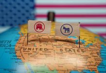 Republican and Democratic flags on USA map background