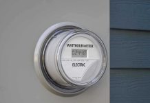 Digital electric meter displaying energy consumption
