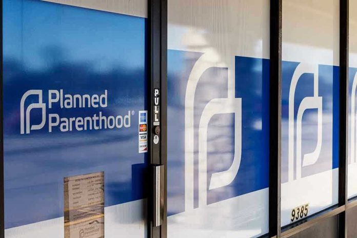 Planned Parenthood office entrance with logo and signs