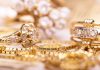 Brazen Heist: $1M Jewel Grab Stuns California Close-up of various gold rings adorned with sparkling gems