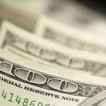 How TRUMP SAVES Kids Food Program During SHUTDOWN Close-up of hundred-dollar bills.