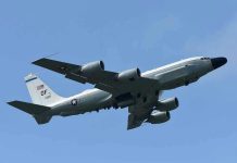 Trump Deploys Bombers —Seen in Attack Formation! Military aircraft flying in clear blue sky.
