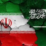 Shocking Execution Claims in Iran’s Latest Crackdown Cracked flags of Iran and Saudi Arabia.