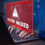 Government Database BREACHED – Records LEAKED! Warning sign System Hacked on laptop screen.