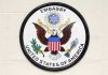 Americans Ordered Out—Embassy ISSUES WARNING Seal of the United States Embassy featuring an eagle and the American flag