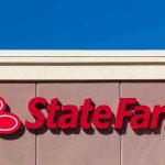 State Farm logo displayed on a building against a blue sky