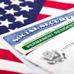 DC Shooting Fallout: Immigration Policy OVERHAUL Social Security card and green card on flag.