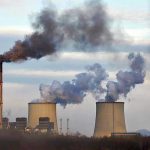 Toxic Leak Paralyzes Town—No One Warned! Industrial plant emitting black smoke into the sky.