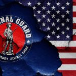 National Guard Members SHOT – IMMEDIATELY Blame Game Starts National Guard logo over a distressed American flag.