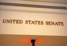 Senator COLLAPSES – Emergency Health Scare Sign displaying United States Senate in a government building